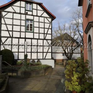 Fachwerkhaus am Kircheneingang - Henning Wiekhorst