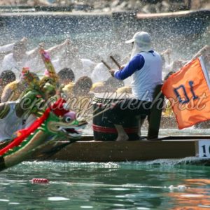 Water splash in a dragon boat race - Henning Wiekhorst