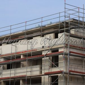 building under construction with scaffolding - Henning Wiekhorst