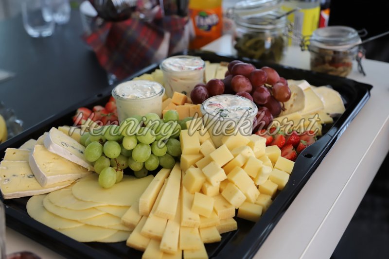 plate of cheese and fruit - Henning Wiekhorst